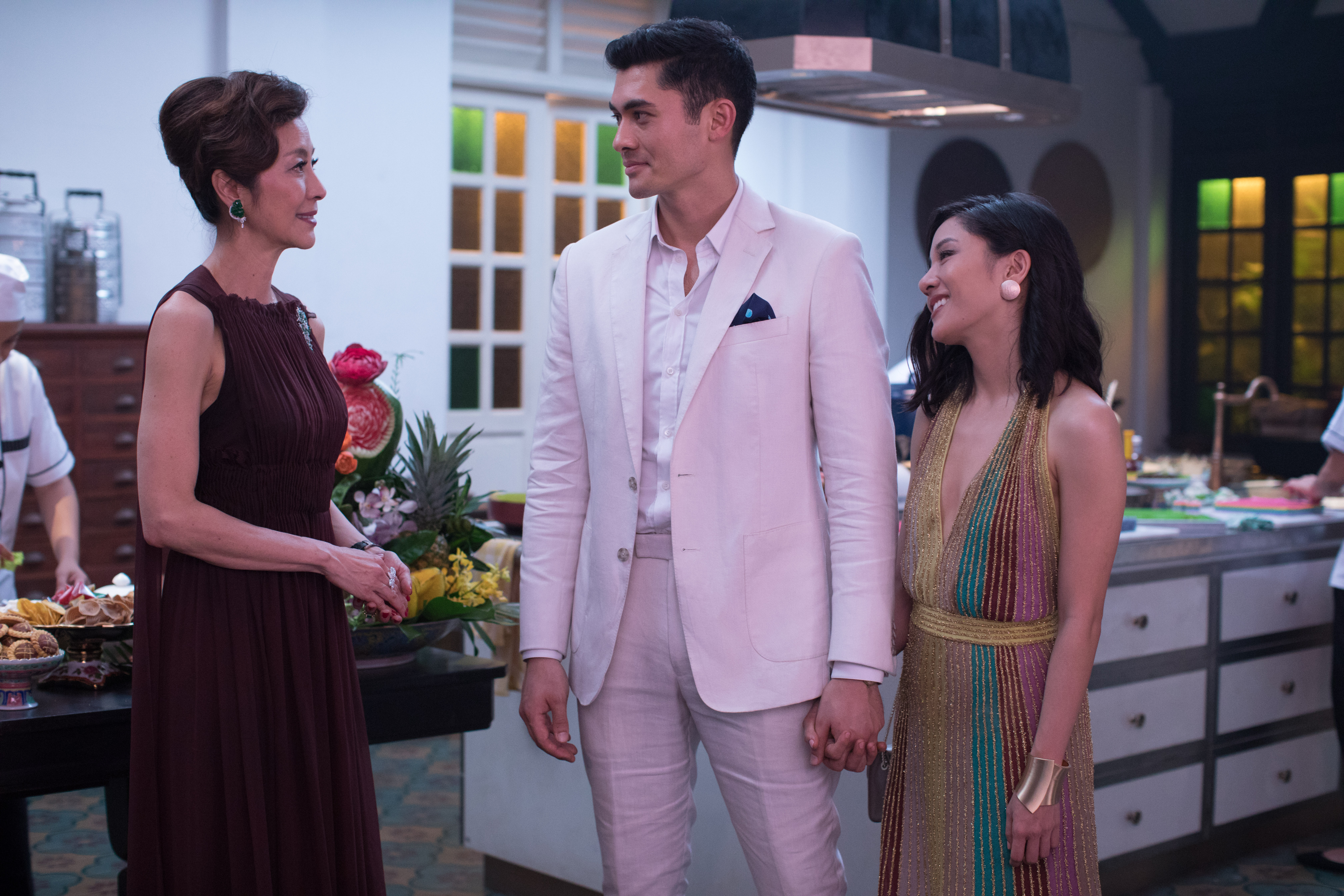 (L-R) MICHELLE YEOH as Eleanor, HENRY GOLDING as Nick and CONSTANCE WU as Rachel in Warner Bros. Pictures' and SK Global Entertainment's contemporary romantic comedy "CRAZY RICH ASIANS," a Warner Bros. Pictures release. Photo Credit: Sanja Bucko